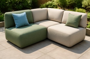Small outdoor corner pocket with two chairs and a tiny table in plants